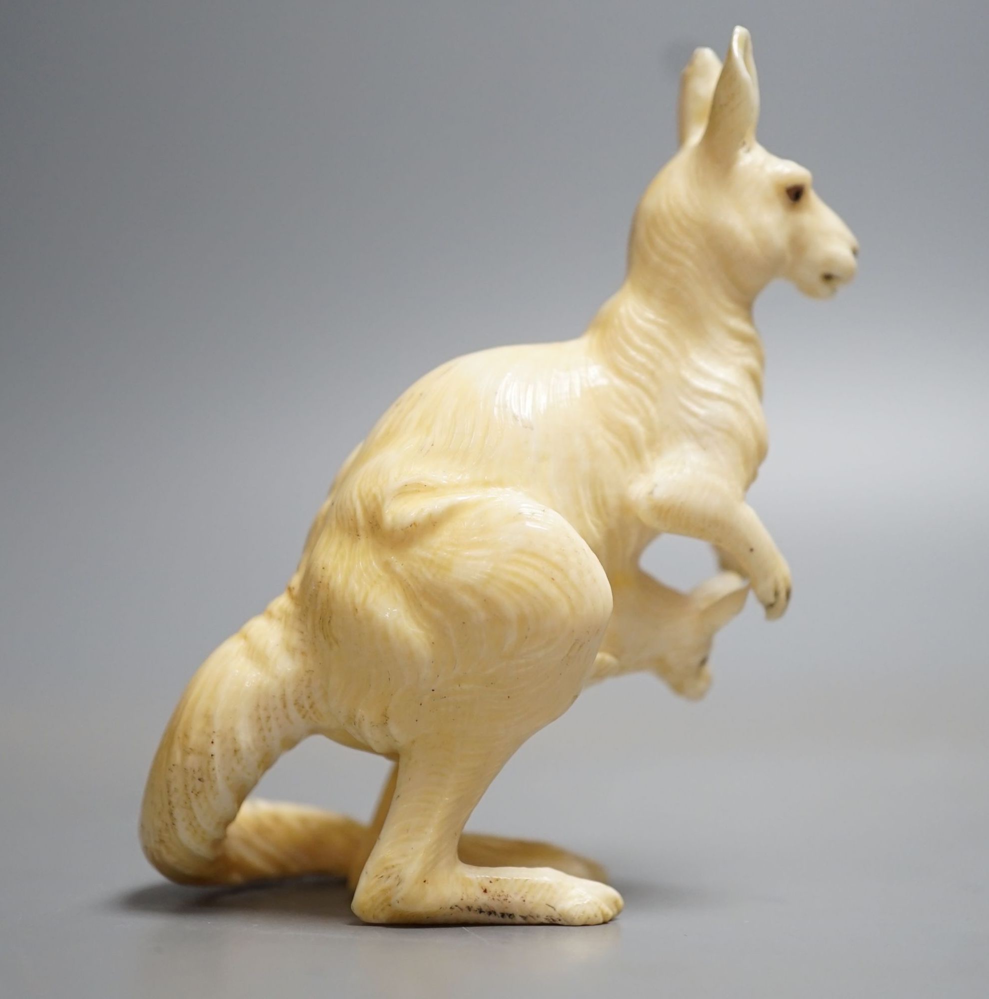 An unusual Japanese ivory okimono of a kangaroo with a Joey in its pouch, Meiji period. 8cm tall